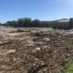 Campi invasi dai detriti dopo l'alluvione