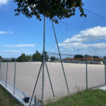Campo in erba sintetica in fase di realizzazione presso il campo sportivo di Brugnetto
